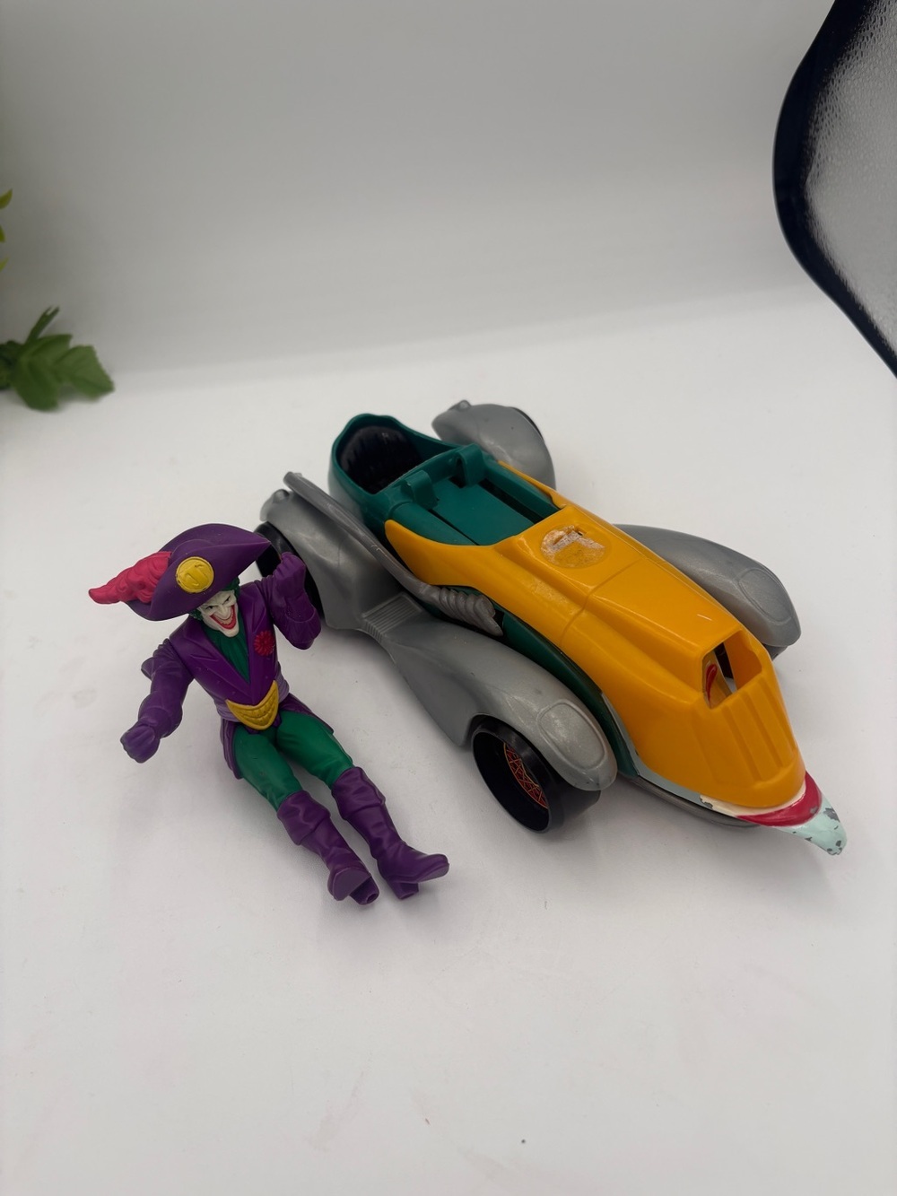 Purple & Yellow Joker Action Figure with Yellow-Green Batmobile Toy